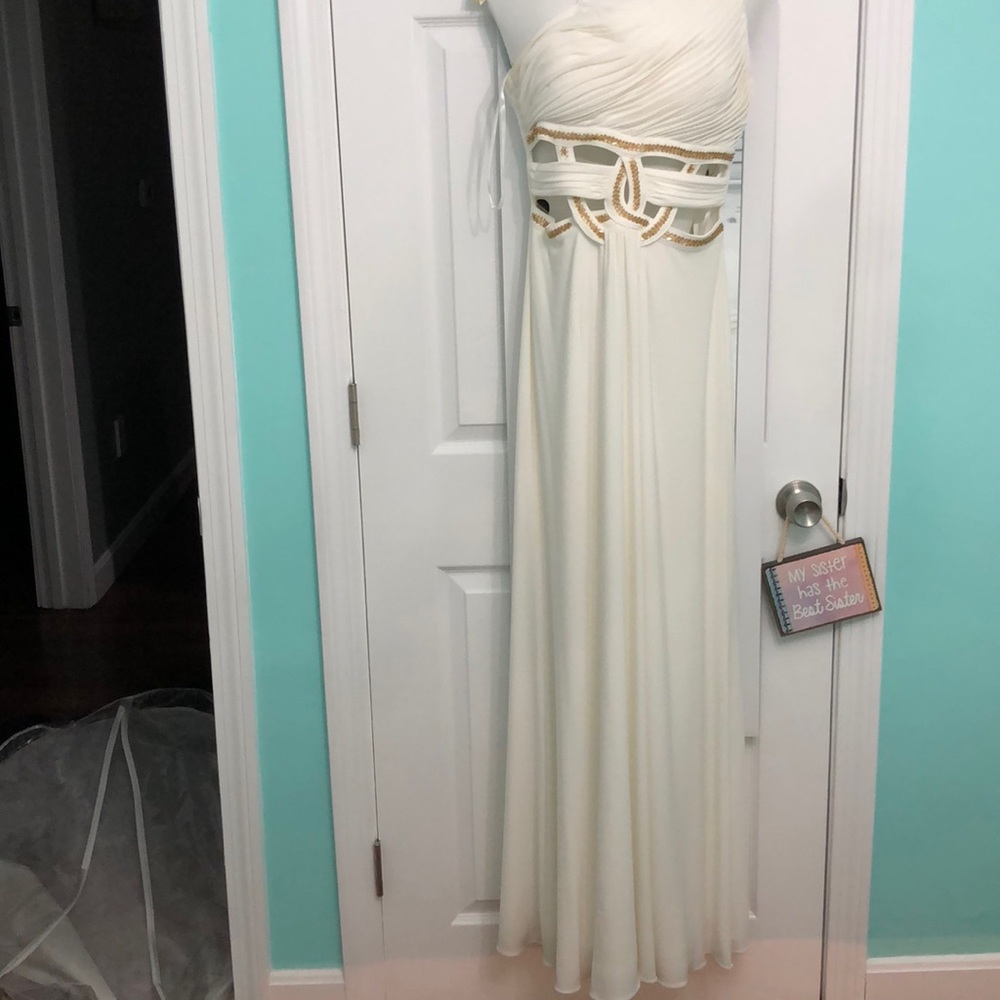 Long cream white prom dress with gold accents